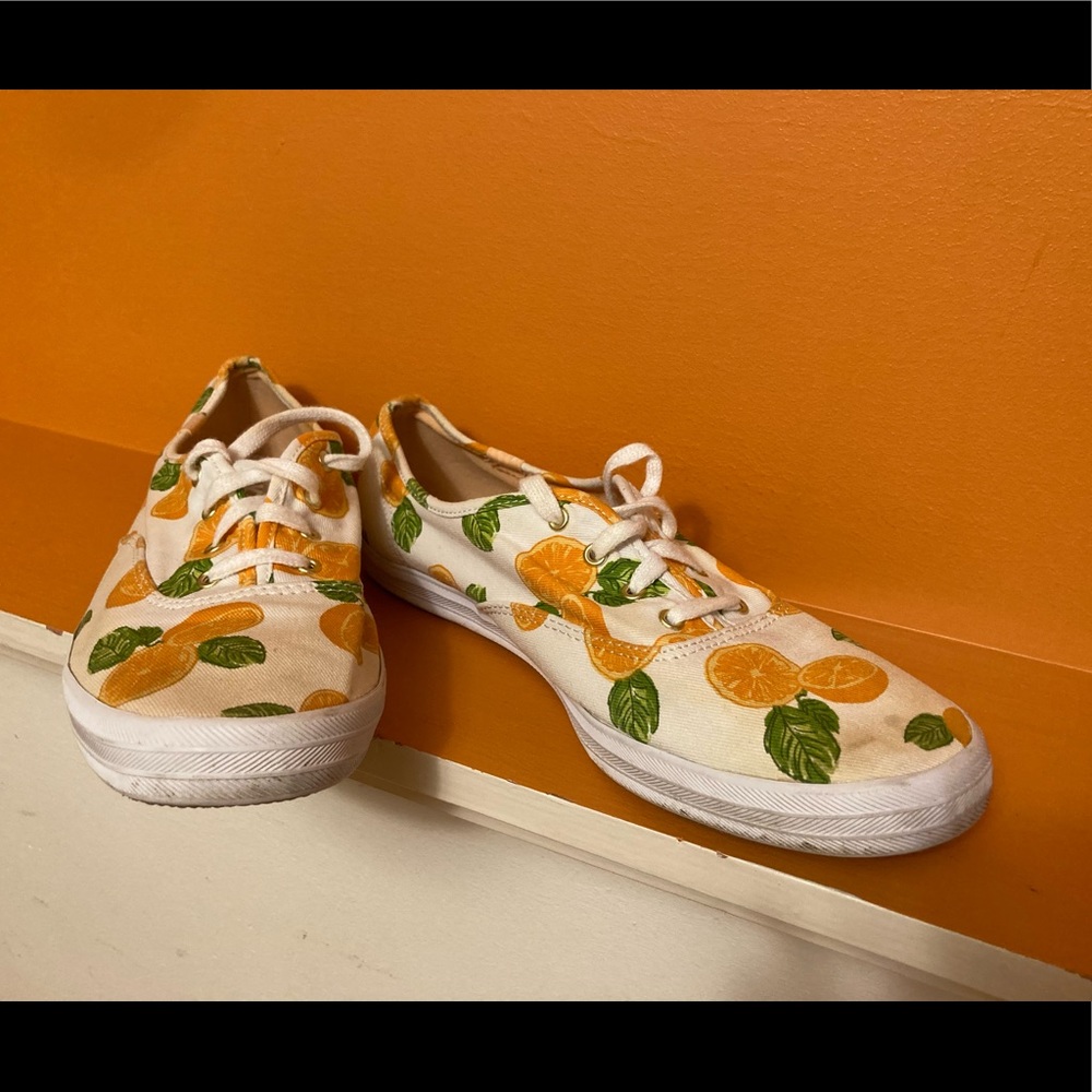 Women’s size 9.5 orange patterned Keds